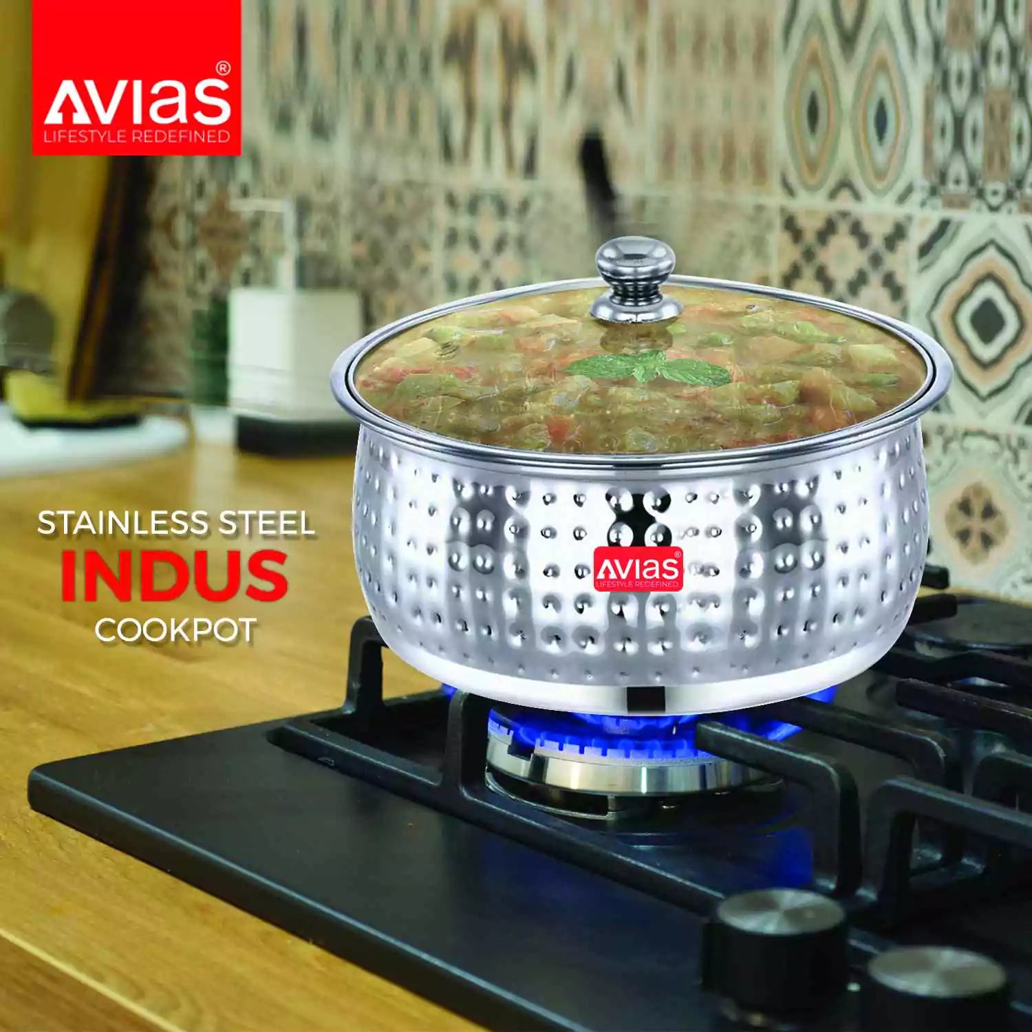 Avias Indus Stainless steel Cookpot 20G Hammered Food Server on stove